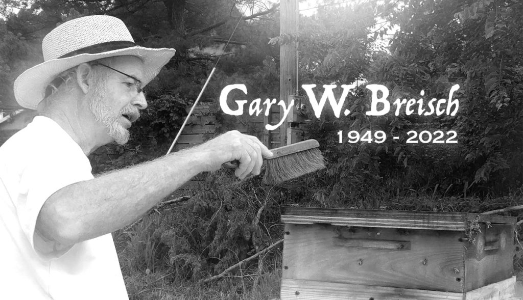 Gary W. Breisch 1949 - 2022, tending to his bees with love.